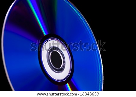close-up computer cd dvd blue-ray disk isolated on black
