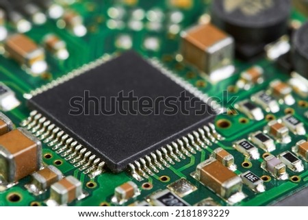 Close-up of computer chip on a part of electronic printed circuit board