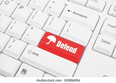 Closeup of computer keyboard with button defend