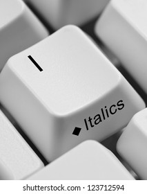 Closeup of computer keyboard keys emphasizing the key  I and Italics