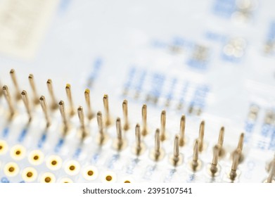 Close-up computer microcircuits lie row after row in the industrial production of computers and office equipment. Concept of developing new technologies and storing information