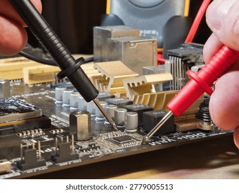 Close-up of Computer Motherboard Components; Macro shot showcasing dusty electronic components, gold heatsinks, and capacitors on a dark PC motherboard, symbolizing repair, technology, and hardware.