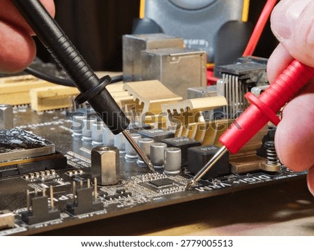 Close-up of Computer Motherboard Components; Macro shot showcasing dusty electronic components, gold heatsinks, and capacitors on a dark PC motherboard, symbolizing repair, technology, and hardware.