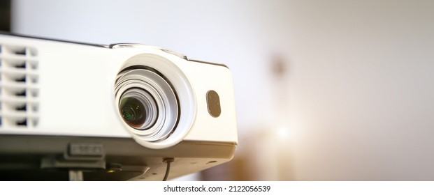 Close-up computer projector on table boardroom or meeting room technology equipment of visual or visualizer for presentation interview or classroom meets tool.