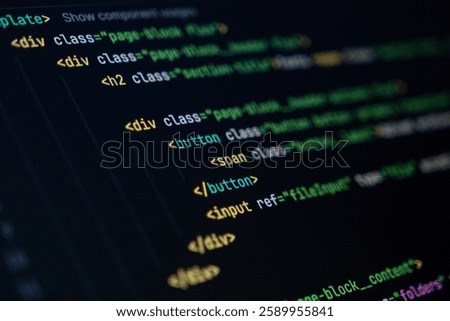 close-up of computer screen with colorful html code, focus on div and button elements, web development and frontend design