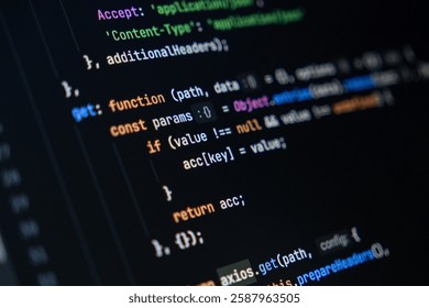 close-up of computer screen with colorful javascript code, focus on function and return keywords, software development and coding