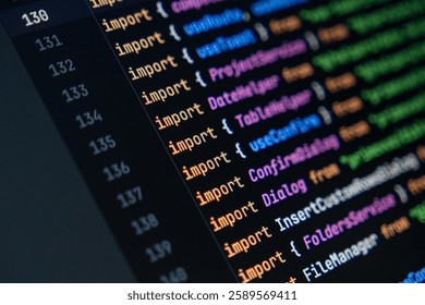 close-up of computer screen with colorful javascript code, focus on import statement, software development and programming
