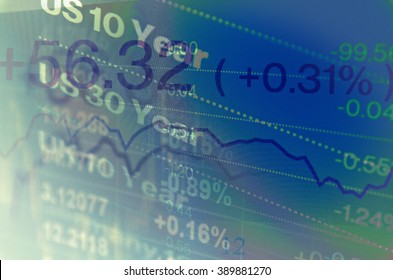 Close-up computer screen with financial data. Multiple exposure photo.