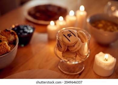 Close-up Of Cookies Decorated With Star Of David On Dining Table On Hanukkah.