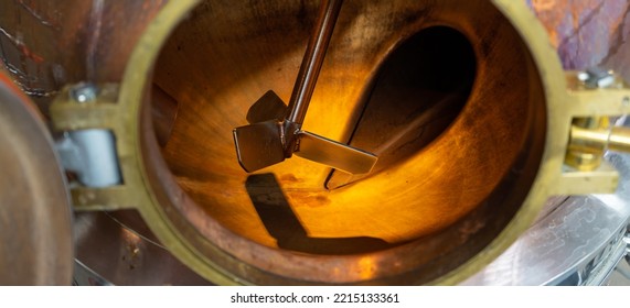 Close-up Of A Copper Still With A Stainless Steel Agitator Taken At A Gin Distillery.Copy Space For Your Design. Web Banner.