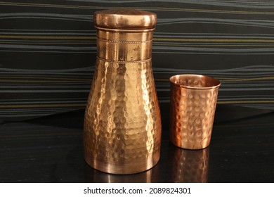 Closeup Of Copper Utensils With Black Background