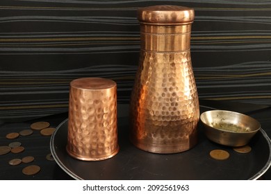 Closeup Of Copper Utensils With Black Background