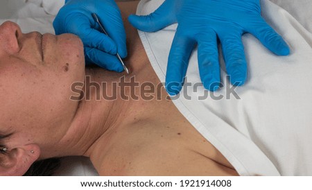 close-up of a corpse being autopsied possibly deceased from covid-19