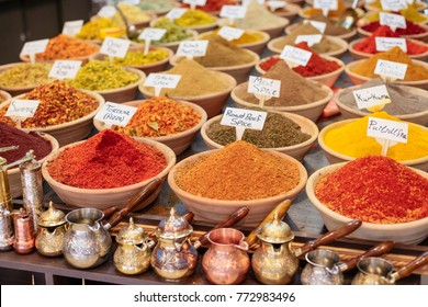 Closeup of a counter with a big  variety of spices on Jerusalem market in Israel. 