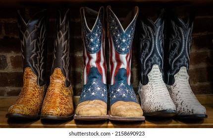 A closeup of Cowboy boots decorated with the American flag on sale in shops in downtown Nashville, Tennessee