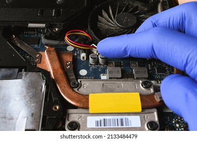 close-up cpu cooling system, copper tubes, laptop parts, laptop repair and maintenance