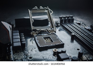 Close-Up of CPU Socket on a Modern Computer Motherboard. Electronic Small Component Details. PC repair or upgrade concept.
