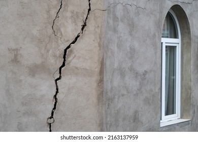 Closeup of cracked wall of house destroyed during strong earthquake in Tbilisi Georgia. Damage on buiding. 