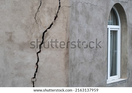 Closeup of cracked wall of house destroyed during strong earthquake in Tbilisi Georgia. Damage on buiding. 