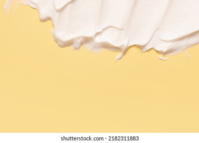 Close-up Cream Moisturiser Smear Smudge Wavy Texture On Colored Background With Copy Space Horizontal Format. Skin Care Beauty Product.