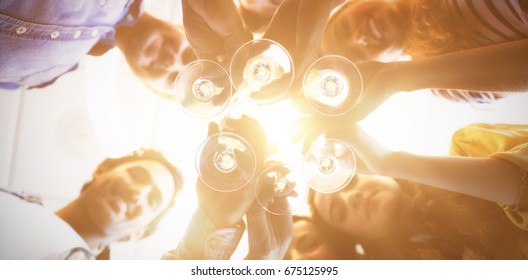 Close-up Of Creative Business Team Having A Toast On Colleges Birthday At Office