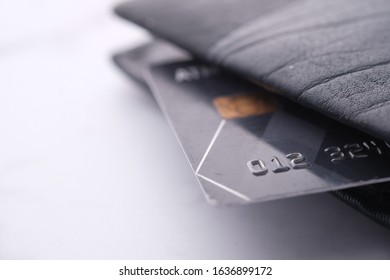 Closeup of credit card in leather wallet  - Shutterstock ID 1636899172