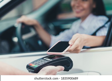 Close-up Cropped View Of Her She Attractive Blurred Content Cheerful Lady, Consumer Riding Sitting In Car Paying Virtual Money Cash Using Device Gadget Buying Goods Web Connection Transaction