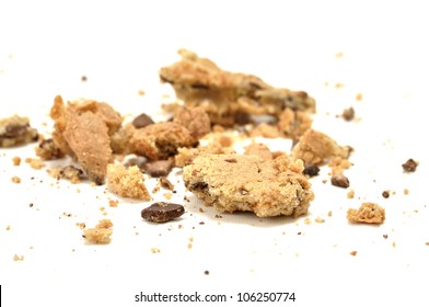 Closeup Of Crumbled Chocolate Chip Cookie On White Floor