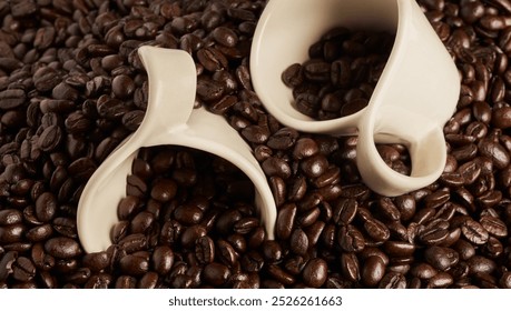 Closeup, cups and organic coffee beans for production, latte and agriculture with brewing process. Sustainability, natural and eco friendly farming with caffeine mug for beverage, roast and espresso