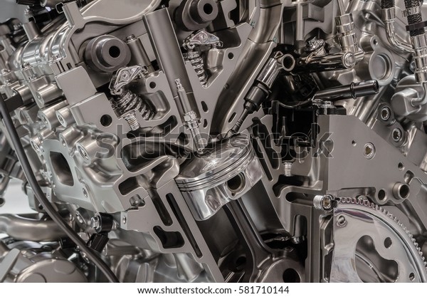 Close-up cutaway of V6\
combustion engine