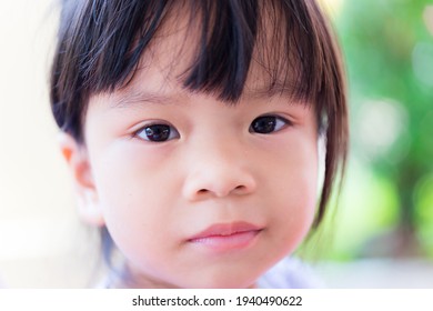 A closeup of a cute Asian girl's face. Happy child. Healthy skin. Children 3-4 years old. - Shutterstock ID 1940490622