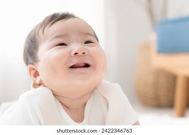 Close-up of a cute crawling baby looking up - Powered by Shutterstock