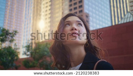 Similar – young asian woman looking up