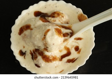 Closeup Of Dahi Bhalle With Black Background