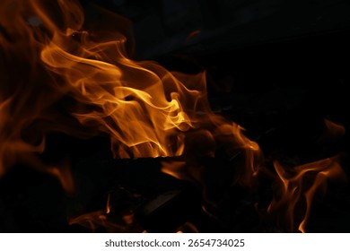 Close-Up of Dancing Flames in Dark Setting: Intense, Energy, Heat, Burning, Fire