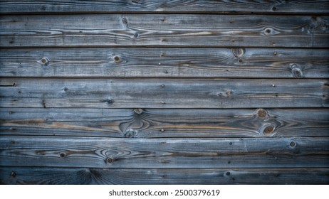 Close-up of dark grey, weathered wooden planks showcasing an intricate old wood texture - Powered by Shutterstock