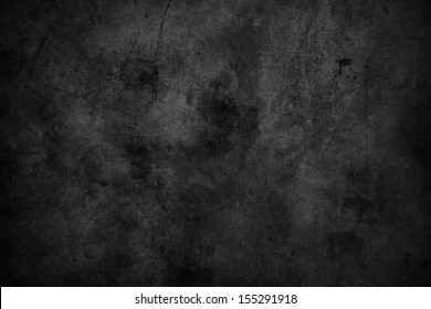 Closeup of dark grunge textured background