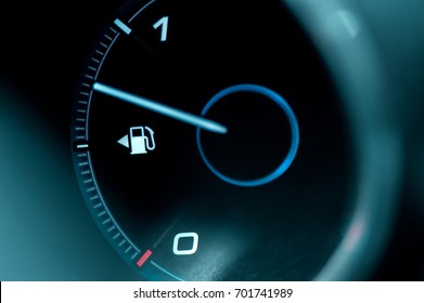 Close-up of the dashboard and fuel gauge in the car - Powered by Shutterstock