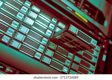 Close-up of a data storage server featuring an open drive bay, highlighting the technology and hardware used in digital storage solutions and infrastructure.