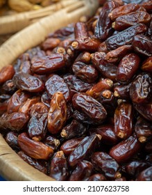 Close-Up Of Dates On Vendors Stall In Chinese Street Market With Selective Focus