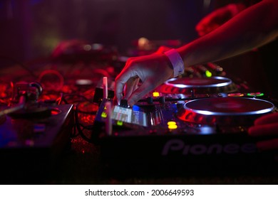 Close-up of a deejay's hand while mixing