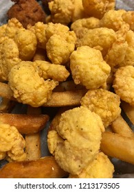 Closeup Of Deep Fry Popcorn Shrimp And French Fries.