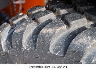 Close-up Of The Deep Tread Of A Tire Of A Bulldozer