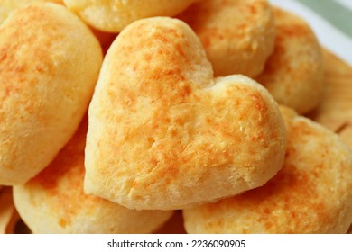 Closeup of Delectable Heart Shaped Freshly Baked Pao de Queijo or Brazilian Cheese Bread - Shutterstock ID 2236090905