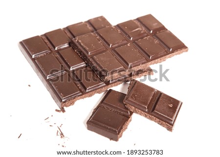 Similar – Image, Stock Photo Chocolate bar on cocoa powder pile. Chocolate and ingredients