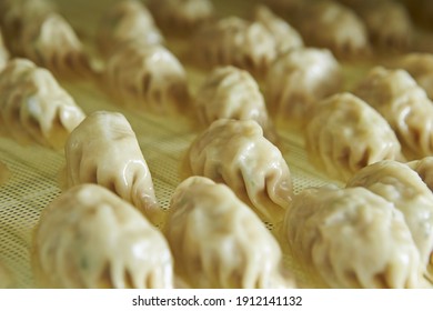 A Closeup Of Delicious Steamed Dumplings