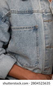 Close-up of denim jacket patch pocket
