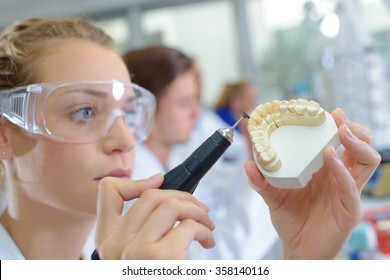 Closeup Of Dental Technician Working