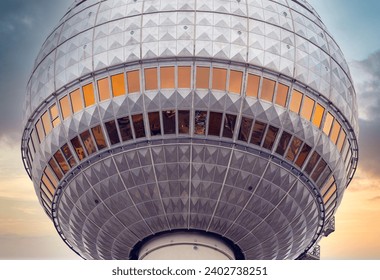 Close-up - Detail of the Berlin TV Tower at Alexanderplatz in Berlin Mitte with dramatic sunset sky - Powered by Shutterstock