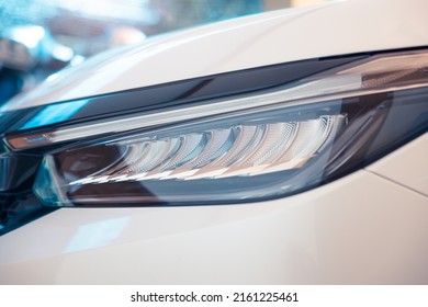 Closeup Detail Of Headlight Of Auto Car Consist Of Led Bulb, Signal Indicator Turn Light, Lamp Part, Daytime Running Light. Concept For Automotive Vehicle, Automobile, Luxury, Polish, Clean And Wash.